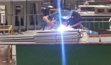 What is the importance of the layout of automobile stamping parts?