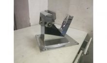 What is the role of the bending machine in the fabrication of automotive sheet metal parts?